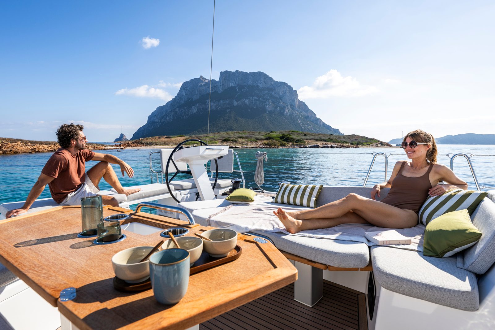 Guests relaxing in the cockpit off Sardinia